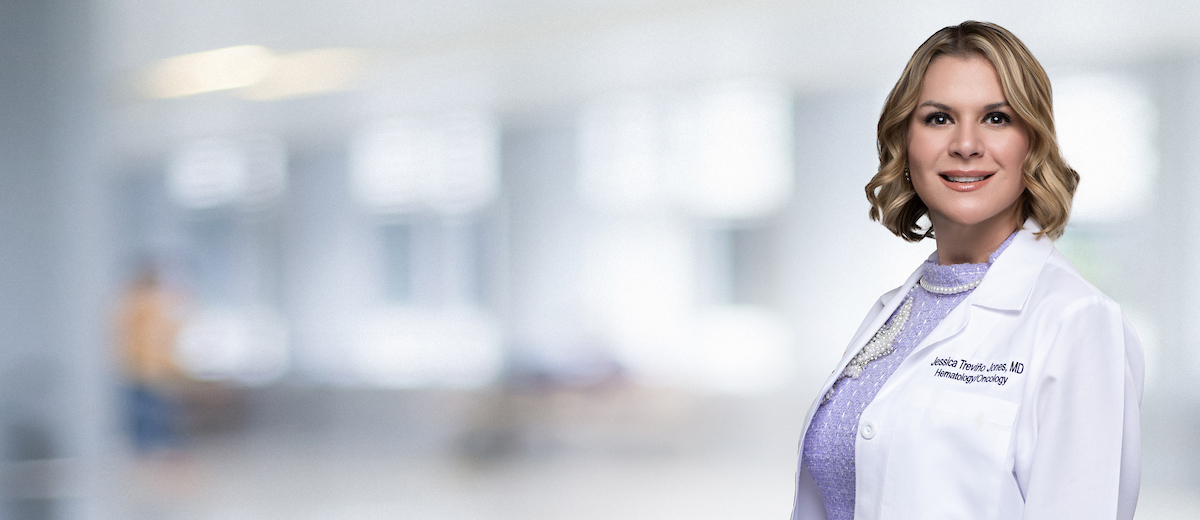 Dr. Jessica Jones in a white coat