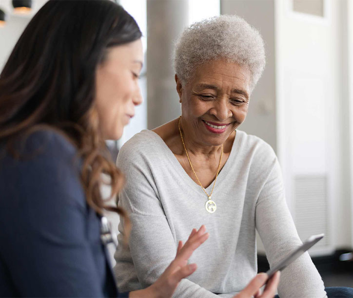 Women making a medical appointment on their smart phone