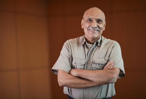 Cancer patient Leonel Rodriguez smiles after beating cancer