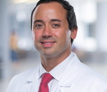 Dr. Gauthier in his white coat